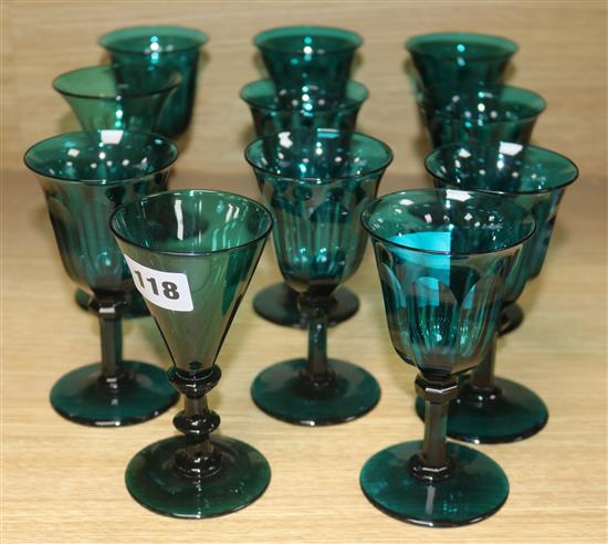 Eleven green glass wines H.13cm